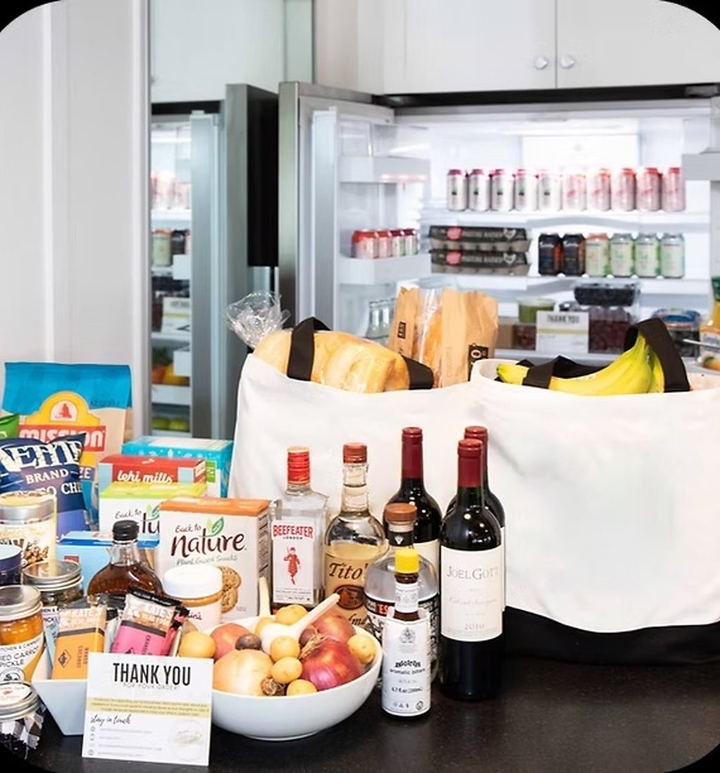 Groceries and provisions stocked in a residence refrigerator before arrival